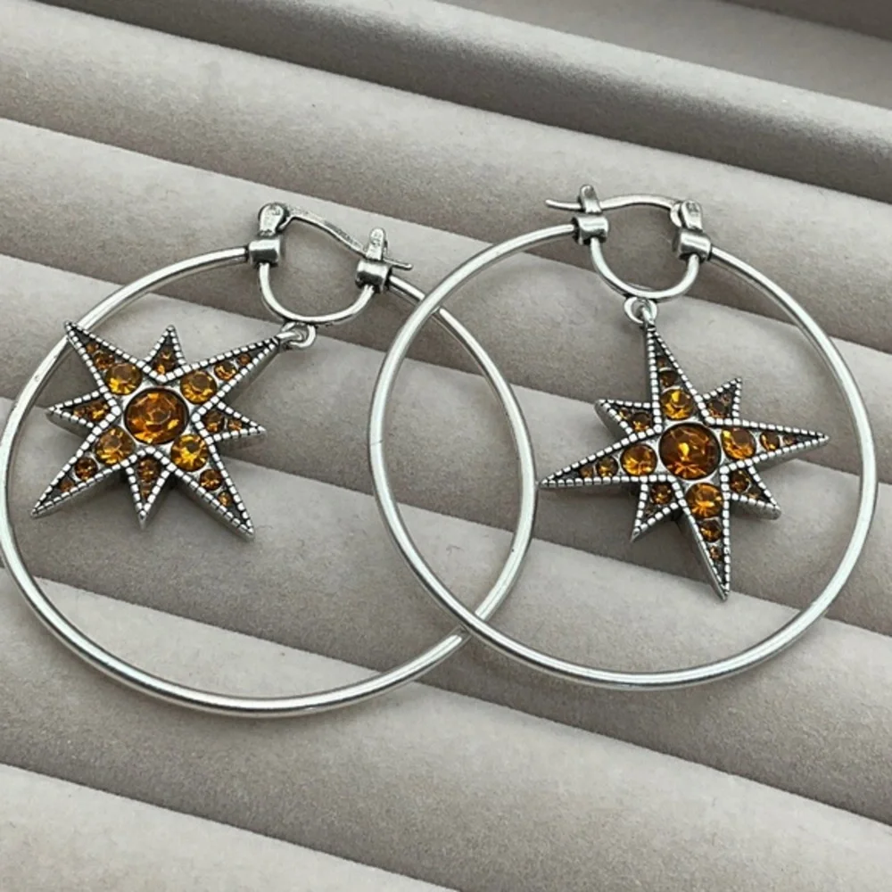 silver hoop earrings with amber stars